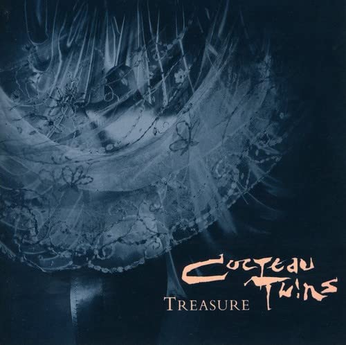 CD cover for Cocteau Twins’ “Treasure” with abstract lace and text.