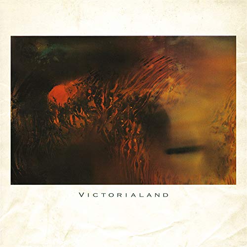 Vinyl record with abstract cover art featuring "Victorialand" title on a dark background.