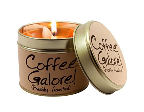 A lit Coffee Galore scented candle in a metal tin with its lid alongside.