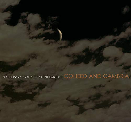 CD album cover: cloudy sky with a crescent moon, band name Coheed & Cambria.