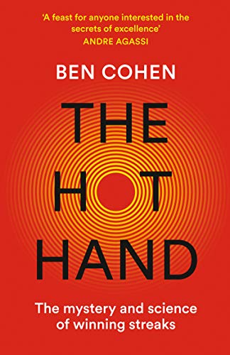 Red book cover with large, bold text: "THE HOT HAND".