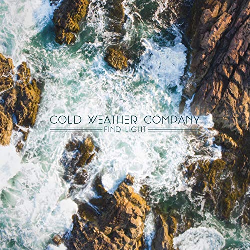 Aerial view of rocky coastline with album title overlayed.