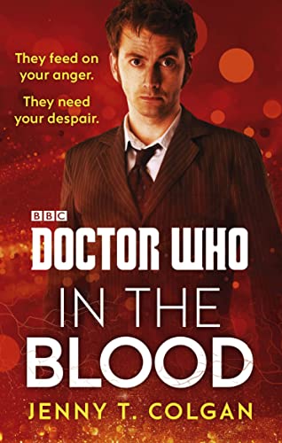 Book cover featuring David Tennant as the Doctor, red background.