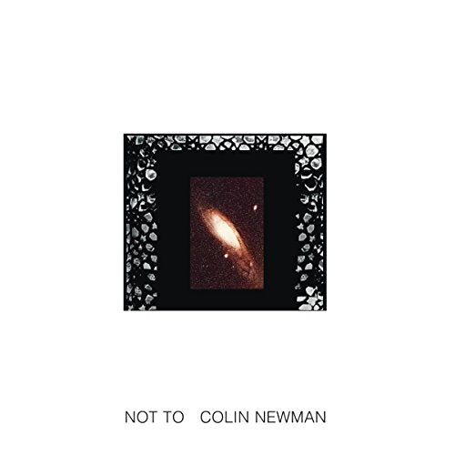 Vinyl record cover: black background with galaxy image and cracked border.
