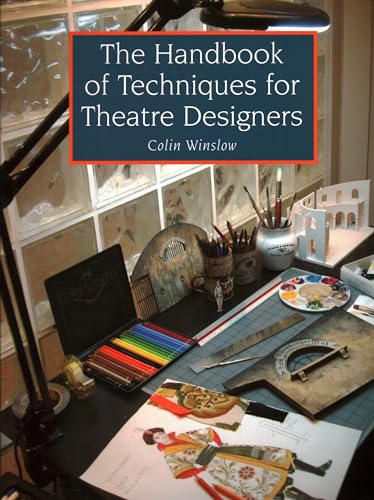 Book titled “The Handbook of Techniques for Theatre Designers” on a desk.