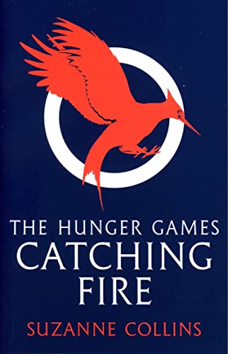 Book cover: red mockingjay symbol over a white circle, title "Catching Fire".