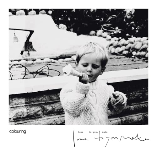 Black and white album cover featuring a young child blowing bubbles.