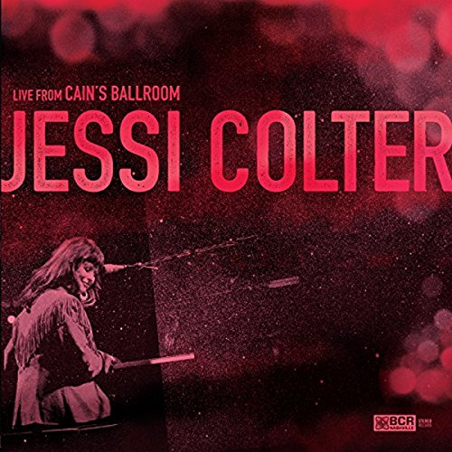 "Red-toned vinyl album cover featuring Jessi Colter performing on stage with a microphone."