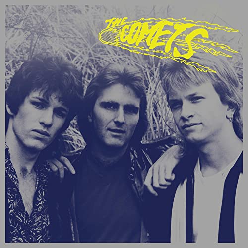 Album cover for The Comets featuring three men in a field.