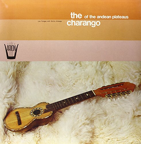 Vinyl record cover featuring a charango on a fluffy white rug.