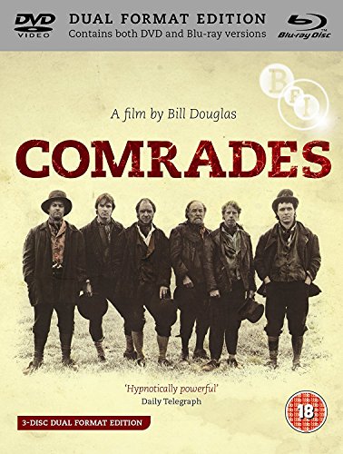 The image depicts the cover of a DVD/Blu-ray set for the film "Comrades." The title is prominently displayed in large red letters, with the tagline "A Film by Bill Douglas" written in smaller text above it. The cover features a sepia-toned photograph of six men standing together, dressed in old-fashioned clothing and hats, conveying a sense of camaraderie and shared purpose.