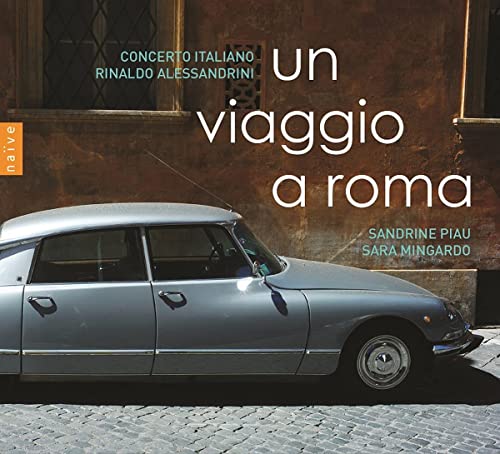 CD cover with silver vintage car in front of a stone wall.