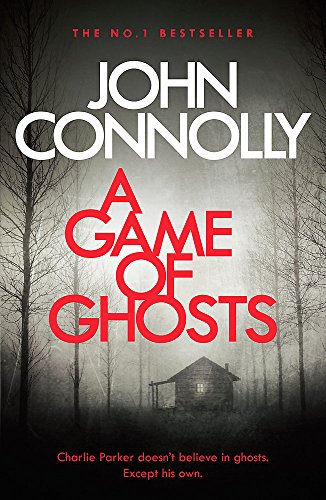 Book cover: dark forest, red title "A Game of Ghosts", small cabin.