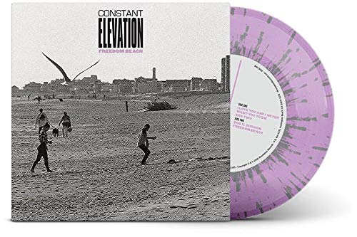 Vinyl record with lilac and white sunburst pattern, beach scene cover art.