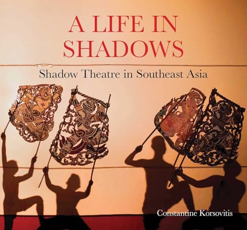 Book cover featuring intricate shadow puppets and silhouetted hands.