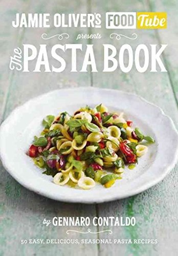 "Cookbook cover featuring a white plate of pasta on a wooden table."