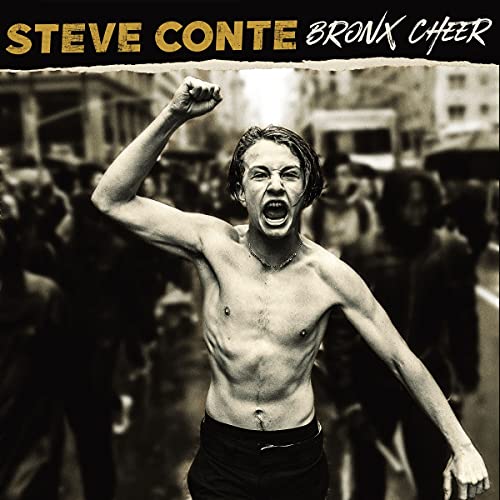 CD cover: shirtless man raising fist in a crowd, sepia tone.
