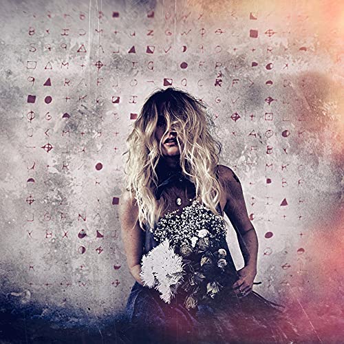 A woman with long blonde hair holds white flowers against a background of symbols.