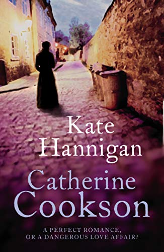 Book cover: woman in dark dress on cobblestone street, title "Kate Hannigan".