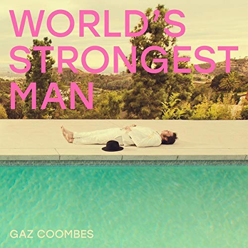 Album cover: man in white suit by a turquoise pool.