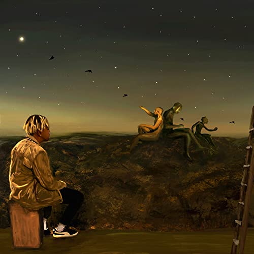 Man looking at statues on a hill under a starry night sky.
