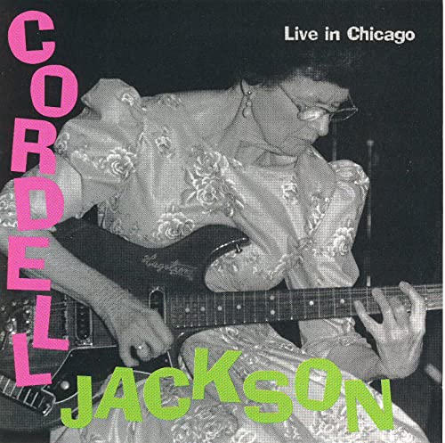 Cordell Jackson playing guitar on CD cover, black and white photo.