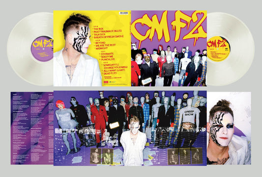 "Clear vinyl records and album artwork featuring a man with painted face."