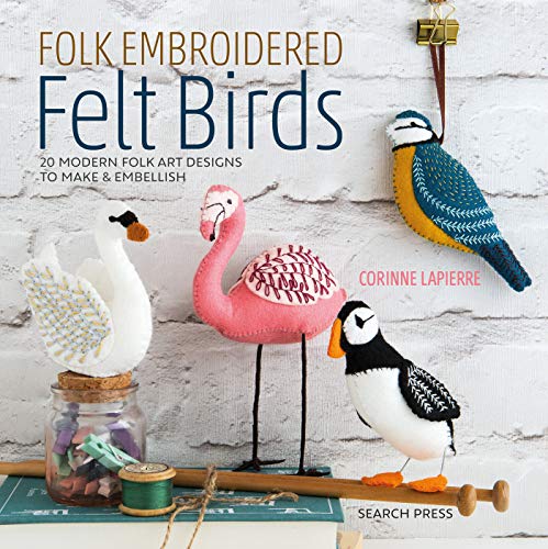 Book cover featuring four embroidered felt birds against a white brick wall background.