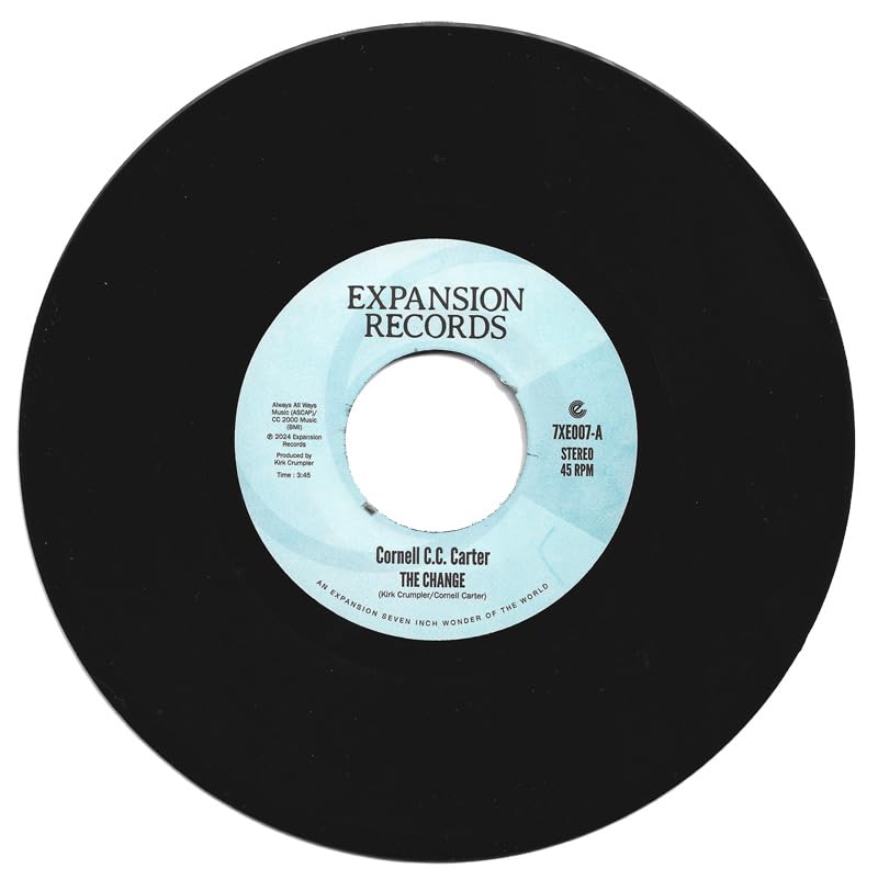 Black vinyl record label with text: Cornell C.C. Carter - The Change.