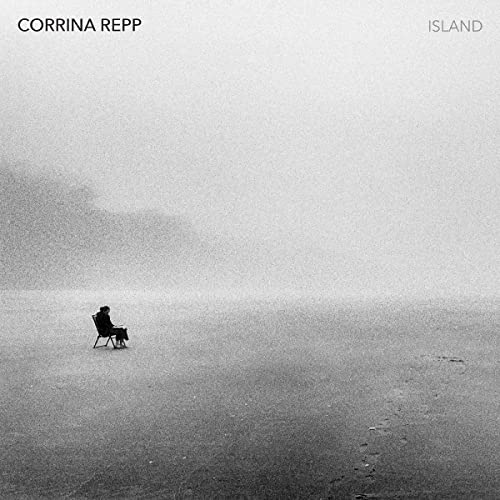 Black and white CD cover with a lone figure in a misty landscape.