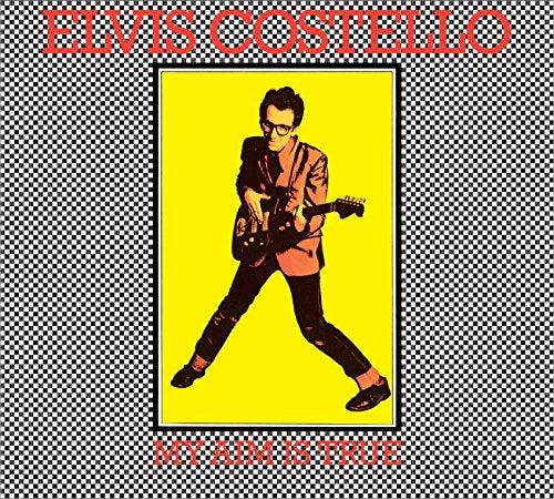 Elvis Costello album cover: a yellow and black checkered, pop art style image.