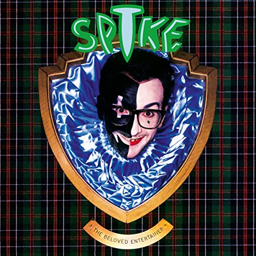 Album cover for Elvis Costello’s “Spike” featuring a half-masked portrait.