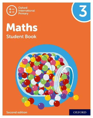 Orange textbook cover with colorful balls in a clear container.