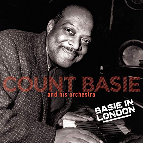 Album cover with Count Basie playing piano, red and white text overlay.