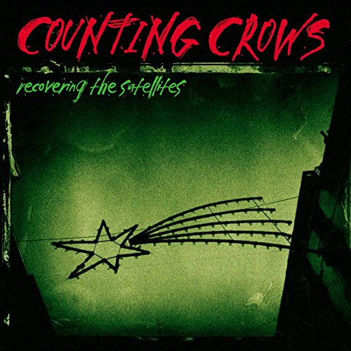 "CD cover art with a green background, red and green text, and a black star."