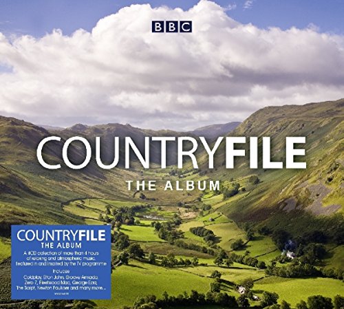 Countryfile" album cover with rolling green hills under a cloudy sky.