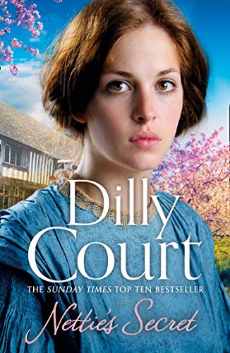 Book cover featuring a woman’s face with a house and blossoms blurred behind.