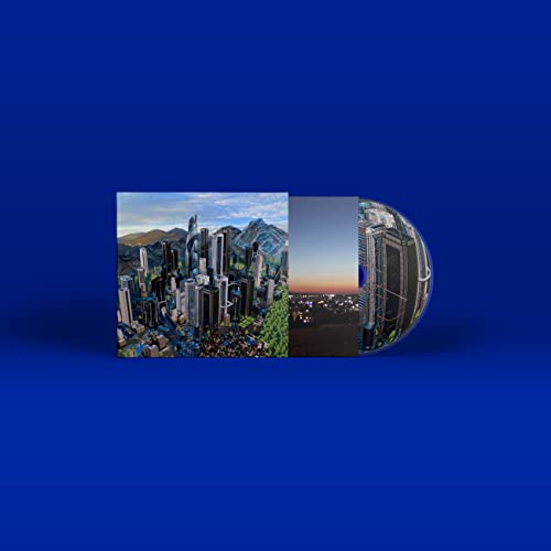 CD case with abstract city skyline artwork on a blue background.