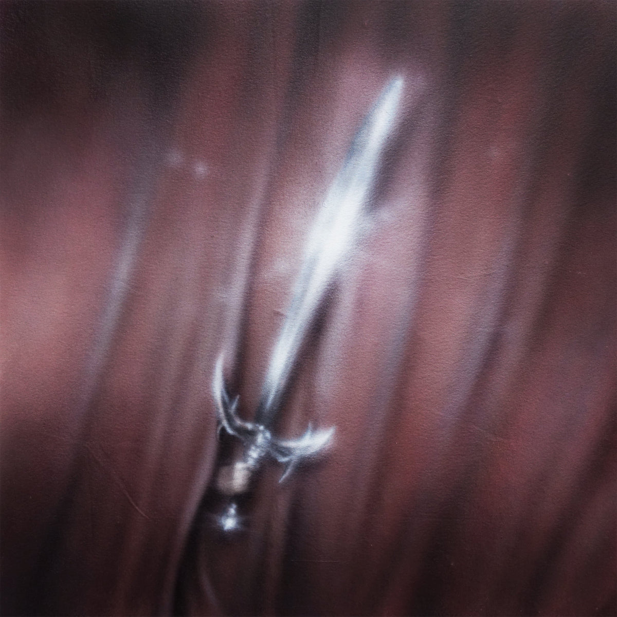 Vinyl record cover with a blurred image of a silver sword.