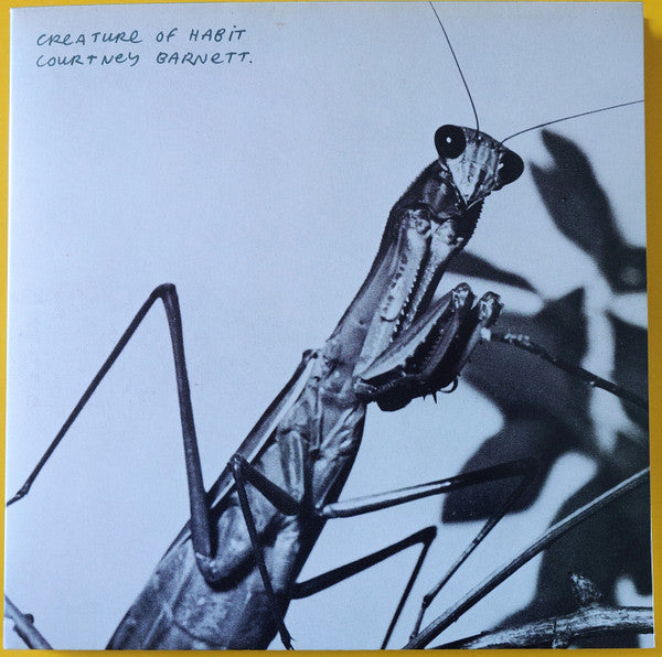 Black and white album cover featuring a close-up of a praying mantis.