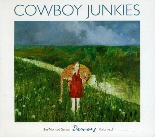 "CD cover art: woman in red dress with wings in a green field."