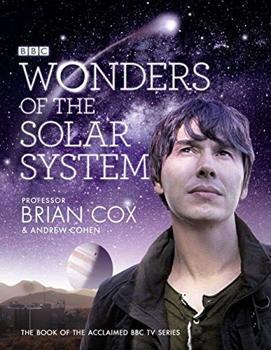 Book cover: “Wonders of the Solar System” with Brian Cox portrait and planets.