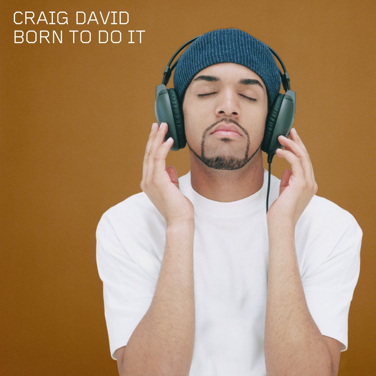 Craig David wearing headphones, album cover for "Born to Do It.