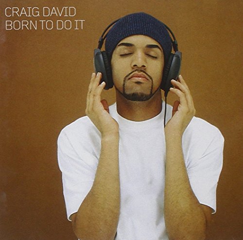 Craig David wearing a beanie and headphones against a brown background on album cover.