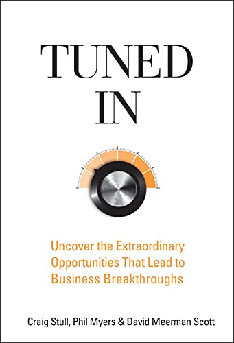 Book cover with large text "TUNED IN" and a tuning dial graphic.