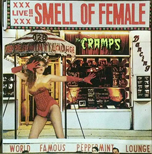 Album cover for The Cramps’ “Smell of Female” featuring a performer.