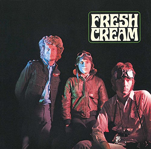 The band Cream posed against a black background with the Fresh Cream logo above.