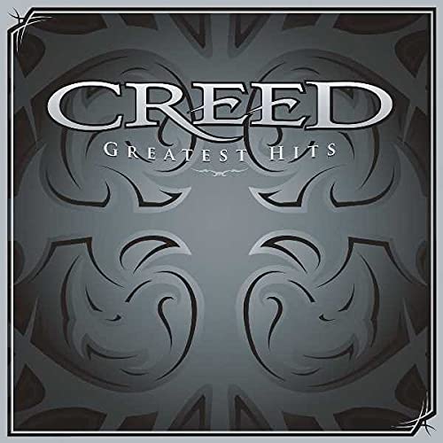 Creed Greatest Hits album cover with metallic silver text on a dark gray background.