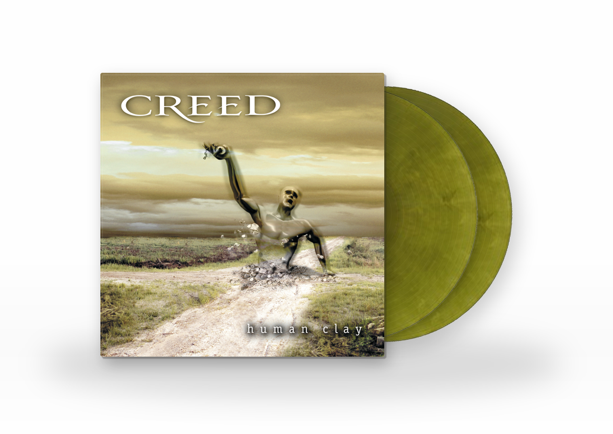 Creed’s “Human Clay” vinyl LP with green-tinted records and sculpted figure.