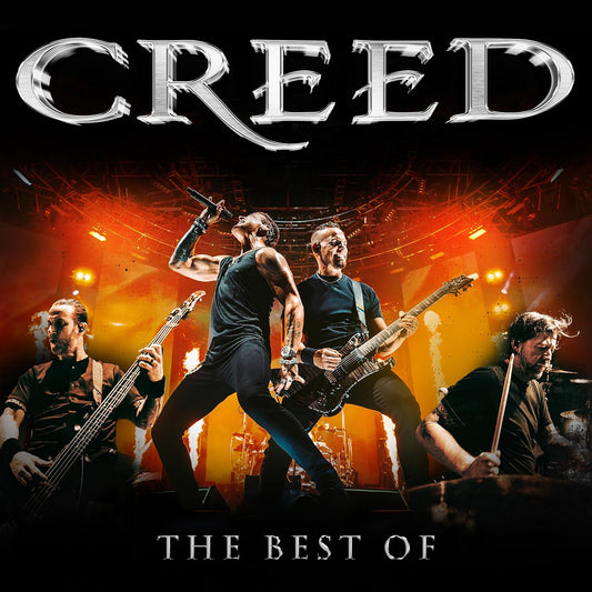 The band Creed performing live on stage with orange lighting and pyrotechnics in background.